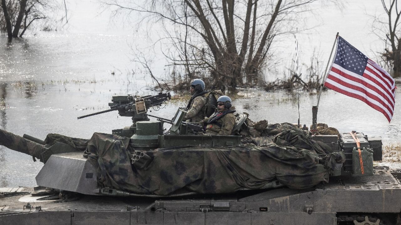 US soldiers on Abrams tanks take part in NATO exercises in Korzeniewo, Polan on March 4, 2024