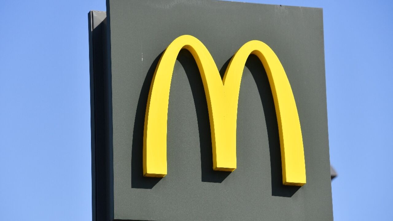 Although profits edged higher, McDonald's executives pointed to a continued drag in sales due to a boycott in the Middle East