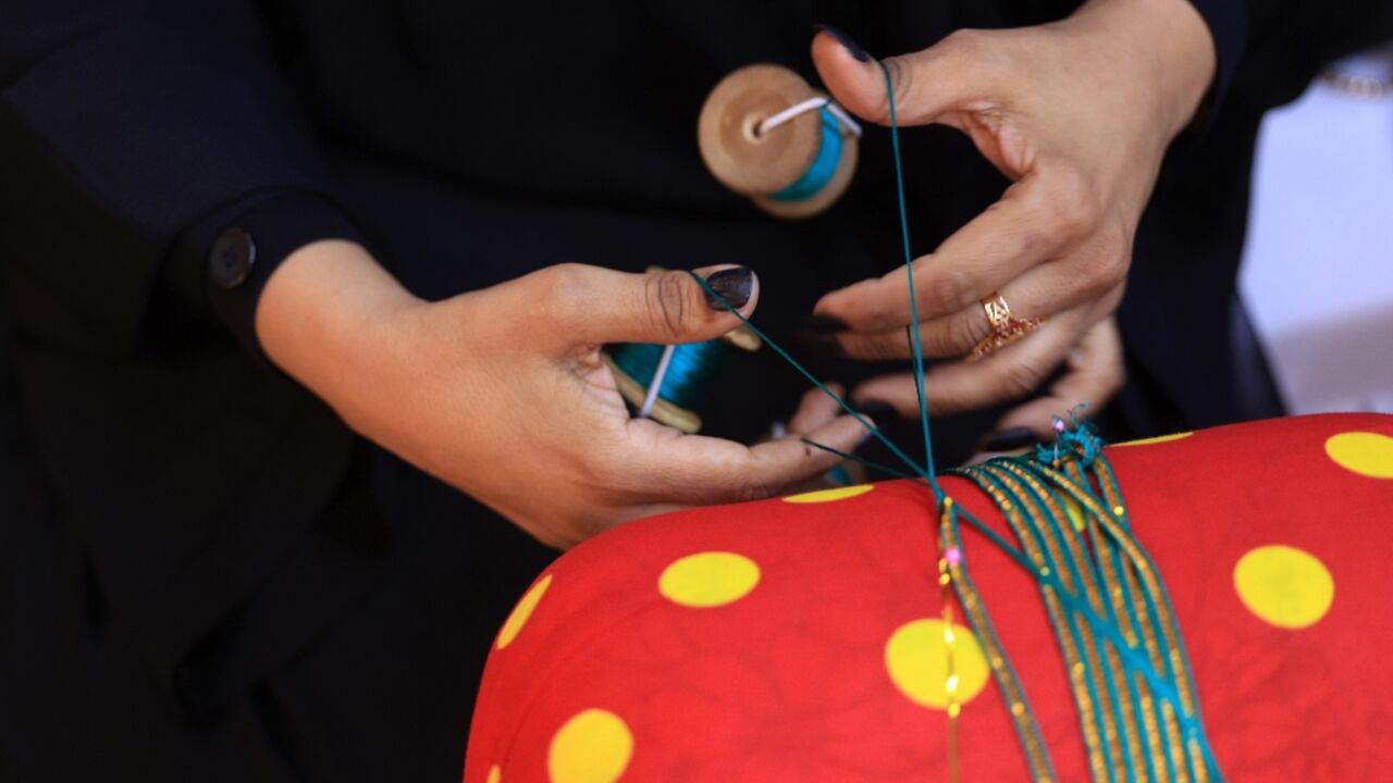 The art of hand-weaving braided shiny ribbons to adorn traditional clothing and bags is called Al Talli, and is on UNESCO's Intangible Cultural Heritage of Humanity list