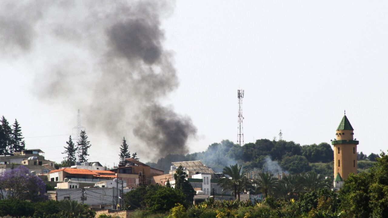 Smoke billows over the Lebanese village of Najjariyeh, where official media says Israel struck