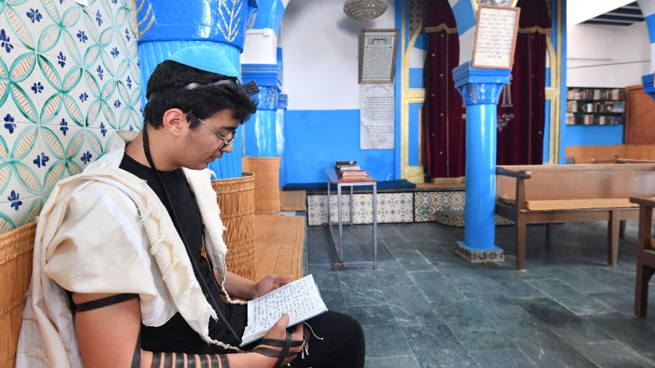 A Tunisian man prays at a synagogue in Djerba during an annual Jewish pilgrimage