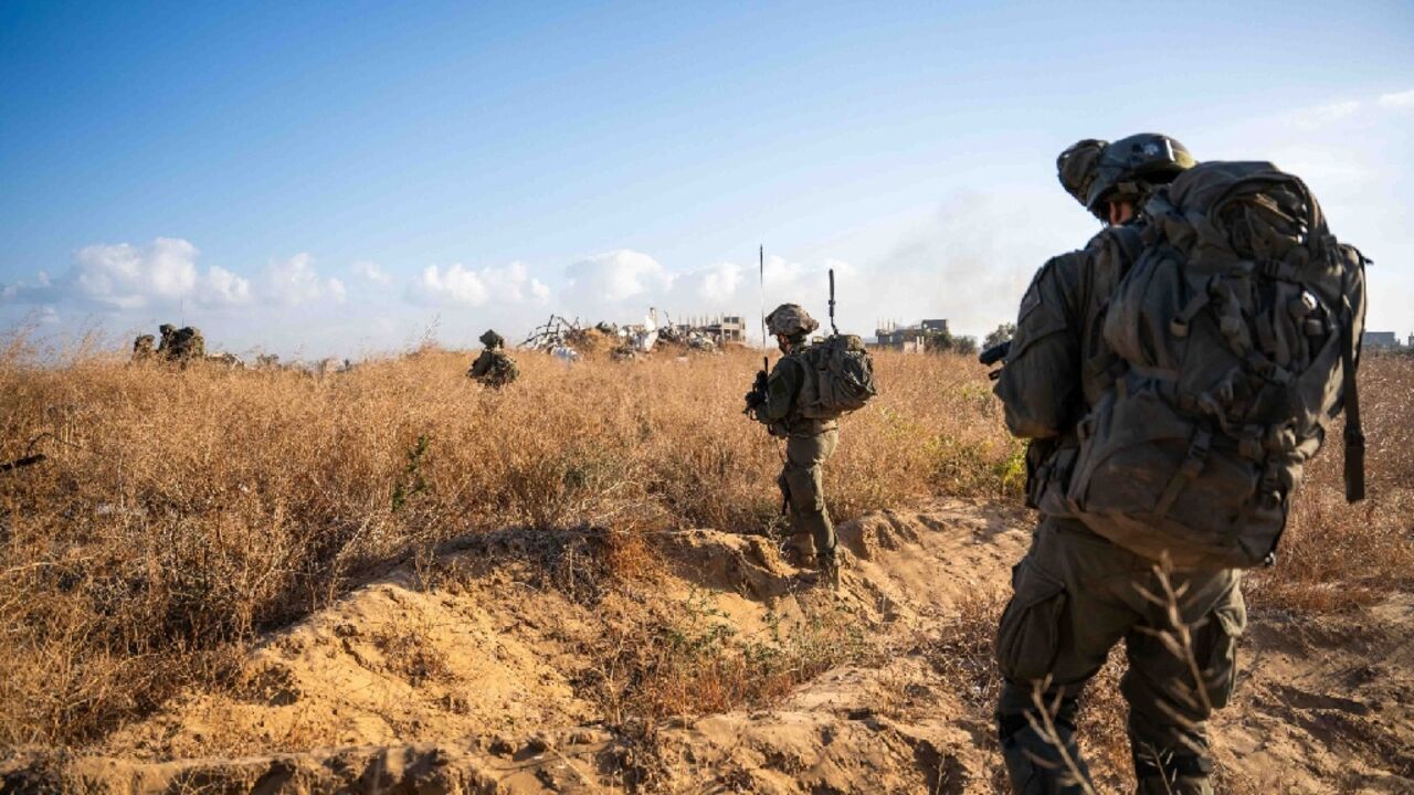 This handout picture released by the Israeli army on June 3, 2024 shows Israeli soldiers during operations in the Gaza Strip 