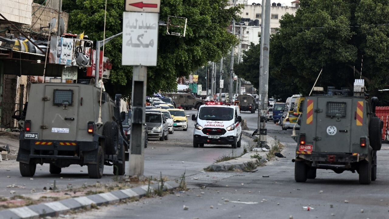 Israeli military vehicles during the raid in Balata
