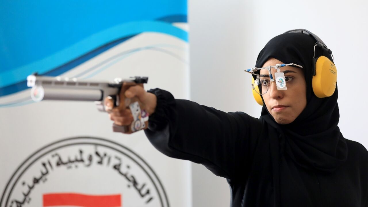 Yemeni air pistol shooter Yasameen al-Raimi trains ahead of the Paris Olympics in Sanaa on July 2, 2024