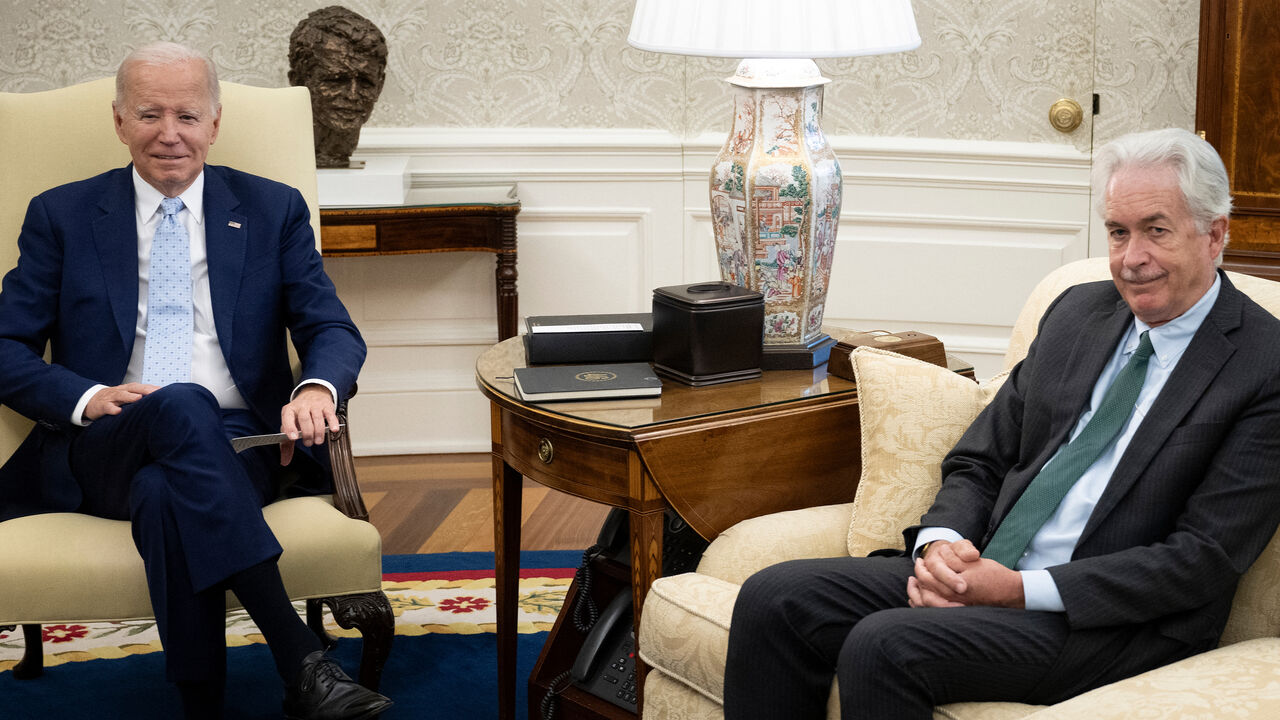 TOPSHOT - US President Joe Biden (L) and Director of the Central Intelligence Agency William J. Burns, wait for a briefing on Ukraine in the Oval Office of the White House October 5, 2023, in Washington, DC. (Photo by Brendan Smialowski / AFP) (Photo by BRENDAN SMIALOWSKI/AFP via Getty Images)
