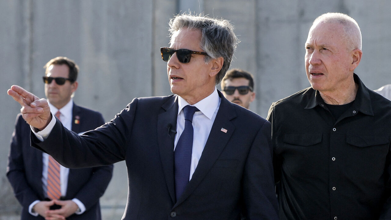 TOPSHOT - US Secretary of State Antony Blinken (C) gestures as he walks with Israeli Defence Minister Yoav Gallant (R) at the Kerem Shalom border crossing with the Gaza Strip in southern Israel on May 1, 2024. (Photo by Evelyn Hockstein / POOL / AFP) (Photo by EVELYN HOCKSTEIN/POOL/AFP via Getty Images)