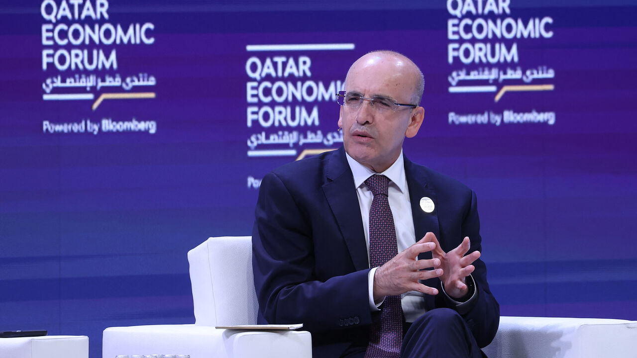 Turkey's Finance Minister Mehmet Simsek speaks during a breakout session on Creating Competitive Economies at the Qatar Economic Forum in Doha on May 15, 2024. (Photo by KARIM JAAFAR / AFP) (Photo by KARIM JAAFAR/AFP via Getty Images)
