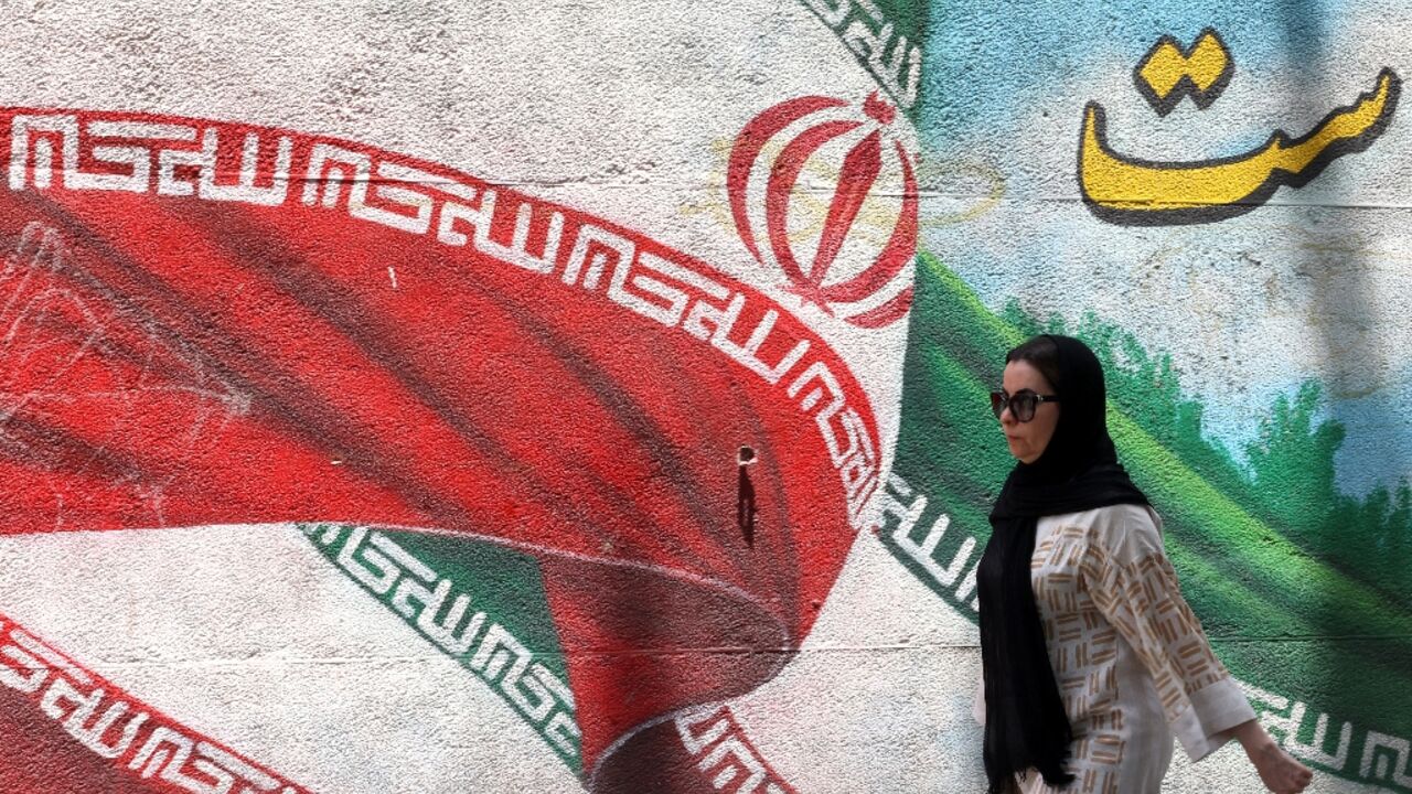 A reformist and an ultraconservative face each other in Friday's Iranian presidential election runoff