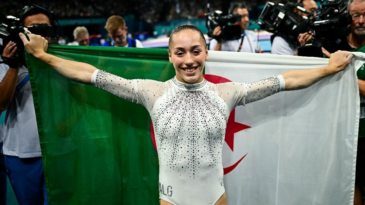 Algeria's Kaylia Nemour celebrates after winning gold