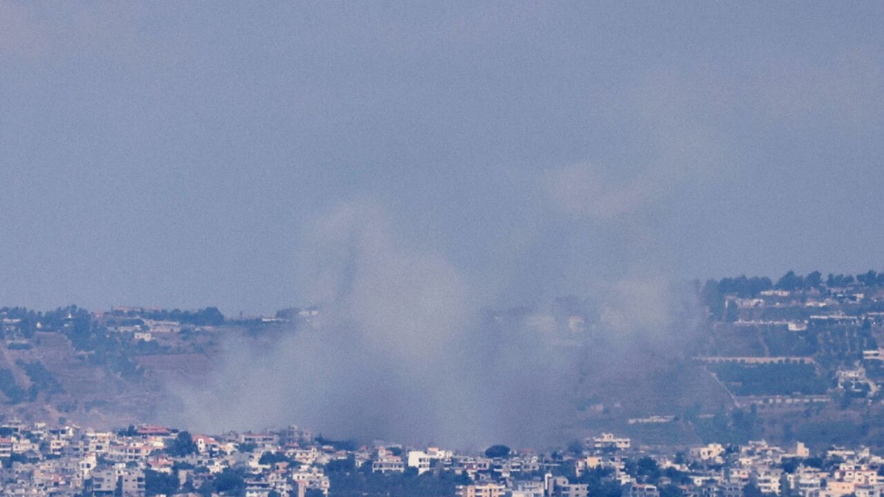 Some billows over the south Lebanon village of Khiam after an Israeli bombardment