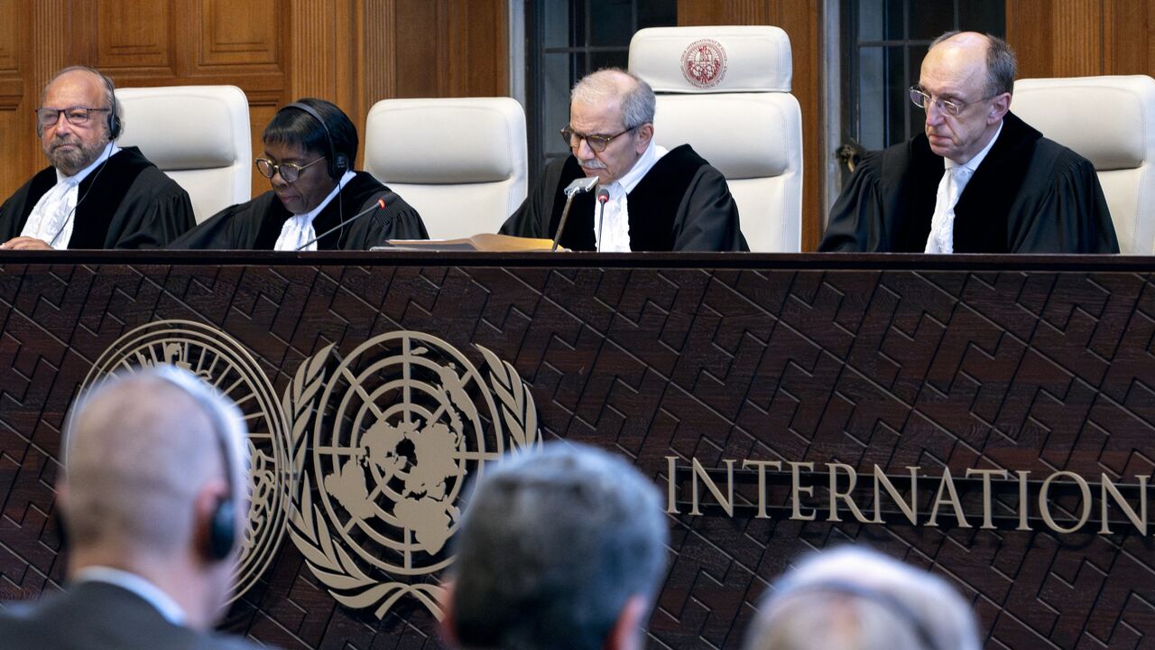 Judge and president of the International Court of Justice (ICJ), Nawaf Salam (2nd R) delivers a nonbinding ruling on the legal consequences of the Israeli occupation of the West Bank and East Jerusalem at the International Court of Justice (ICJ) in The Hague on July 19, 2024. 