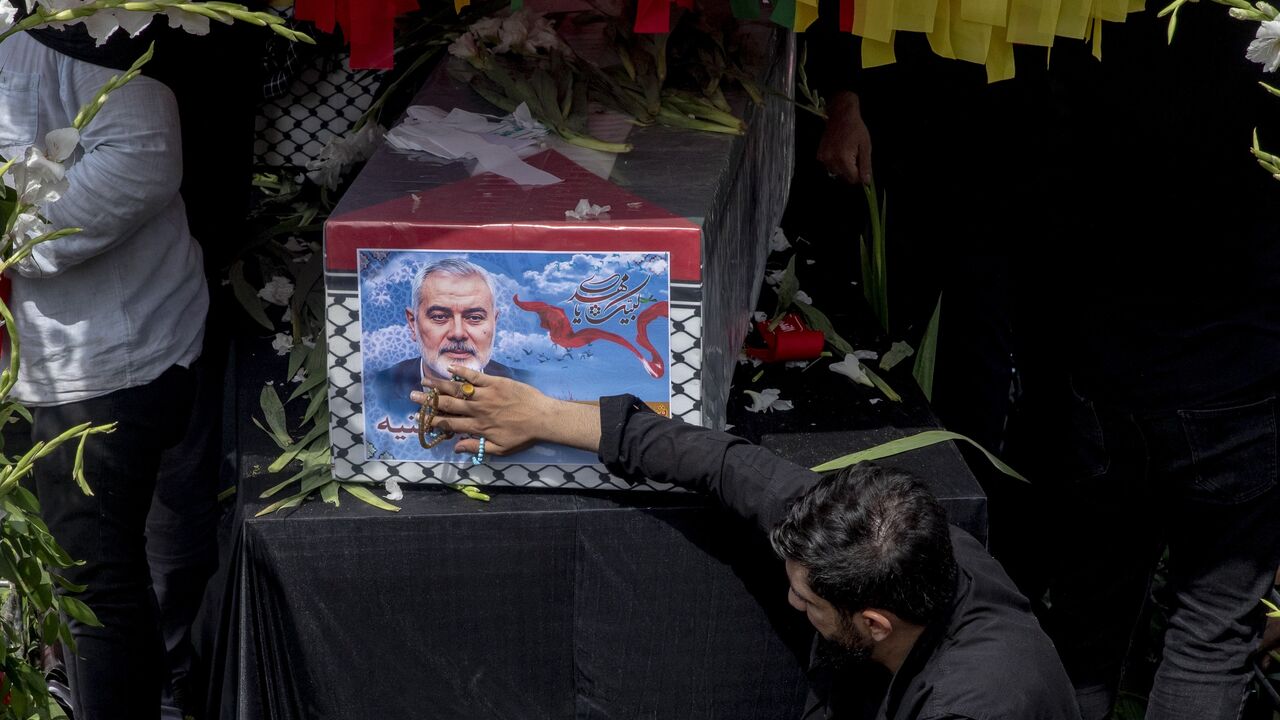 Iranians attend a funeral ceremony in Tehran on Aug. 1, 2024, for Hamas political chief Ismail Haniyeh, who was assassinated the day before in the Iranian capital.