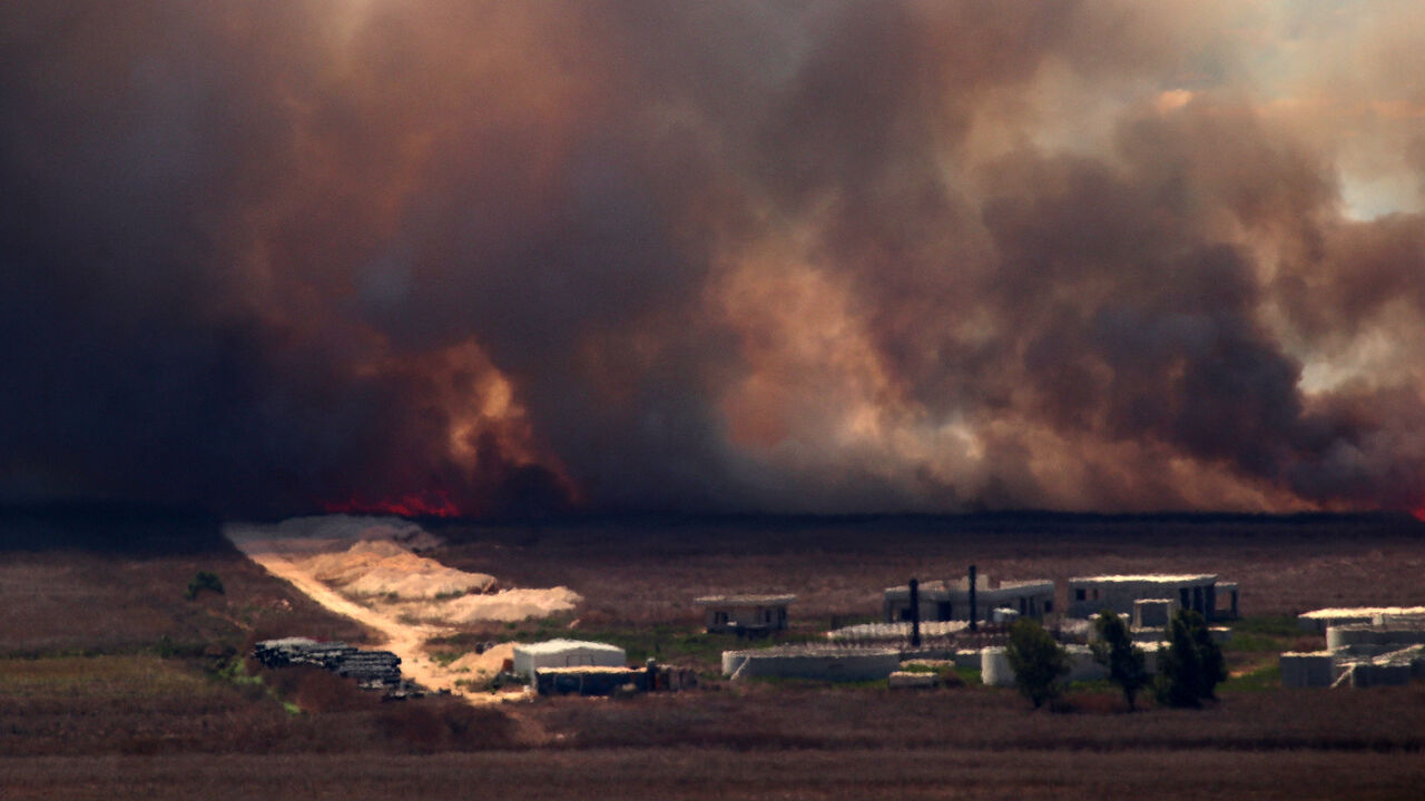 Fire sweep over the Marjayoun plain in southern Lebanon near the border with Israel after being hit by Israeli shelling on August 16, 2024, amid the ongoing cross-border clashes between Israeli troops and Hezbollah fighters. (Photo by RABIH DAHER / AFP) (Photo by RABIH DAHER/AFP via Getty Images)