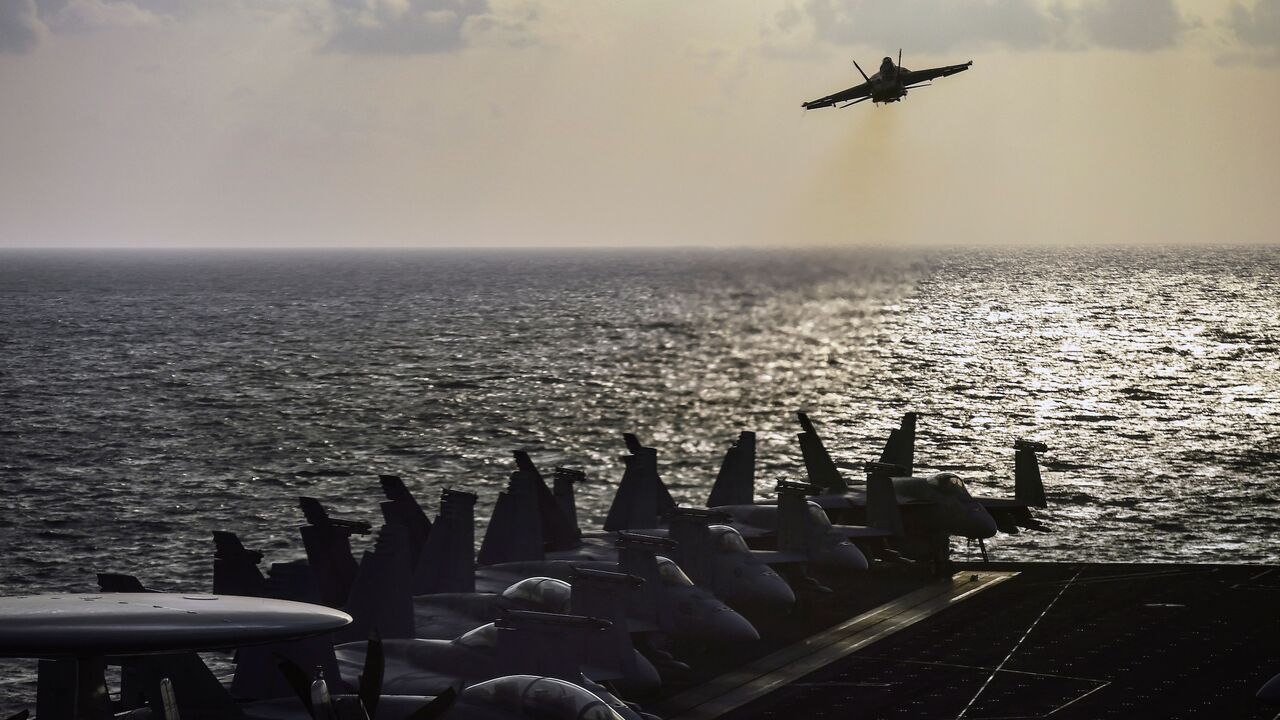 An F18 fighter jet takes off from the aircraft carrier Harry S Truman in the eastern Mediterranean Sea, May 8, 2018.