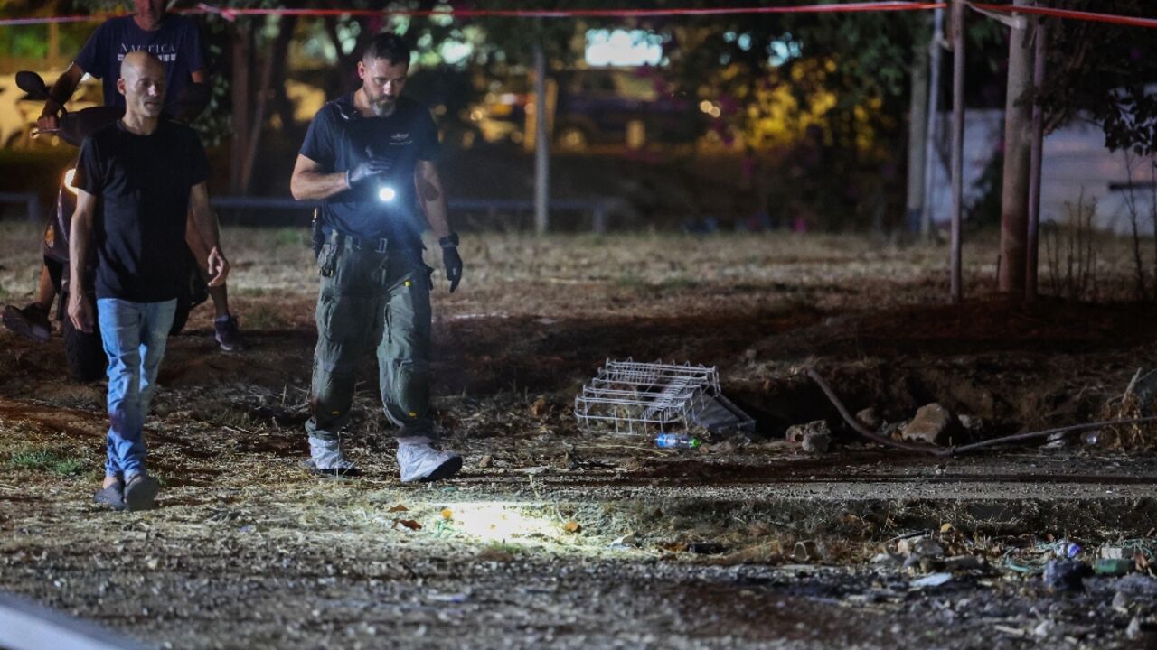 Israeli security forces at the site of the Sunday blast in Tel Aviv