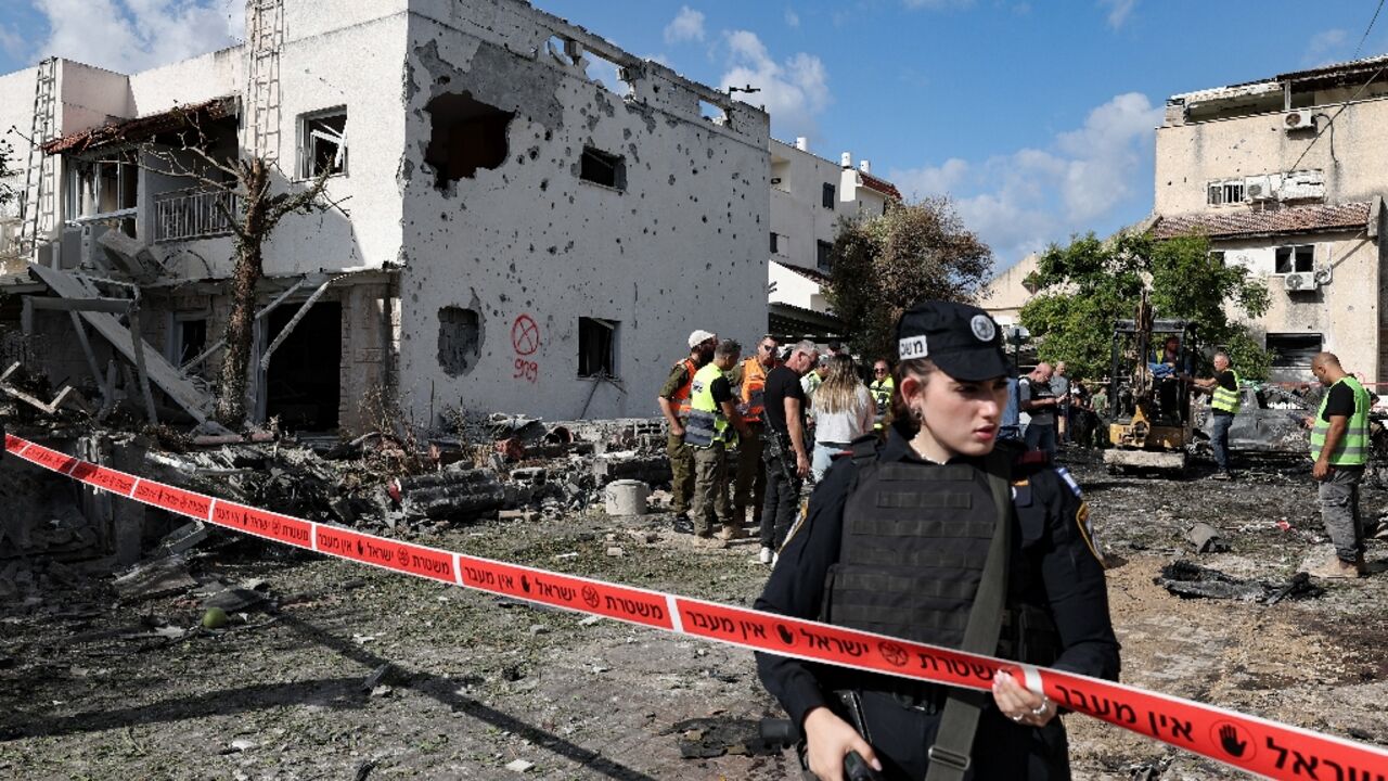 Damage in an area near north Israel's Haifa city after rocket fire from Lebanon