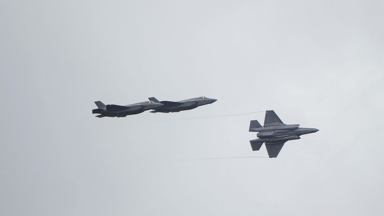 The first delivered batch of F-35 fighter jets flies over the Skrydstrup Air Base, Denmark, Sep. 14, 2023.