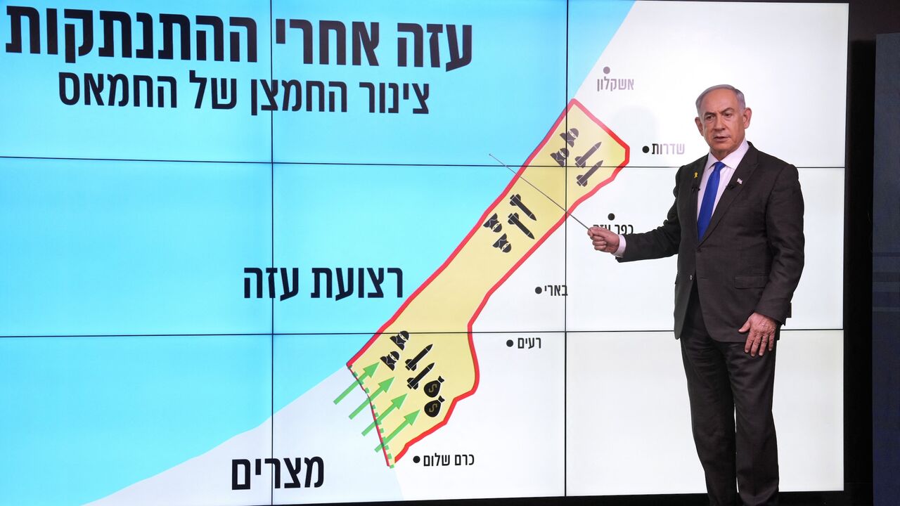 Israeli Prime Minister Benjamin Netanyahu stands before a map of the Gaza Strip during a news conference in Jerusalem on September 2, 2024.