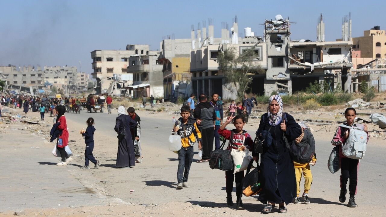 Displaced Palestinians fleeing Israeli military operations in Beit Lahia in the northern Gaza strip 