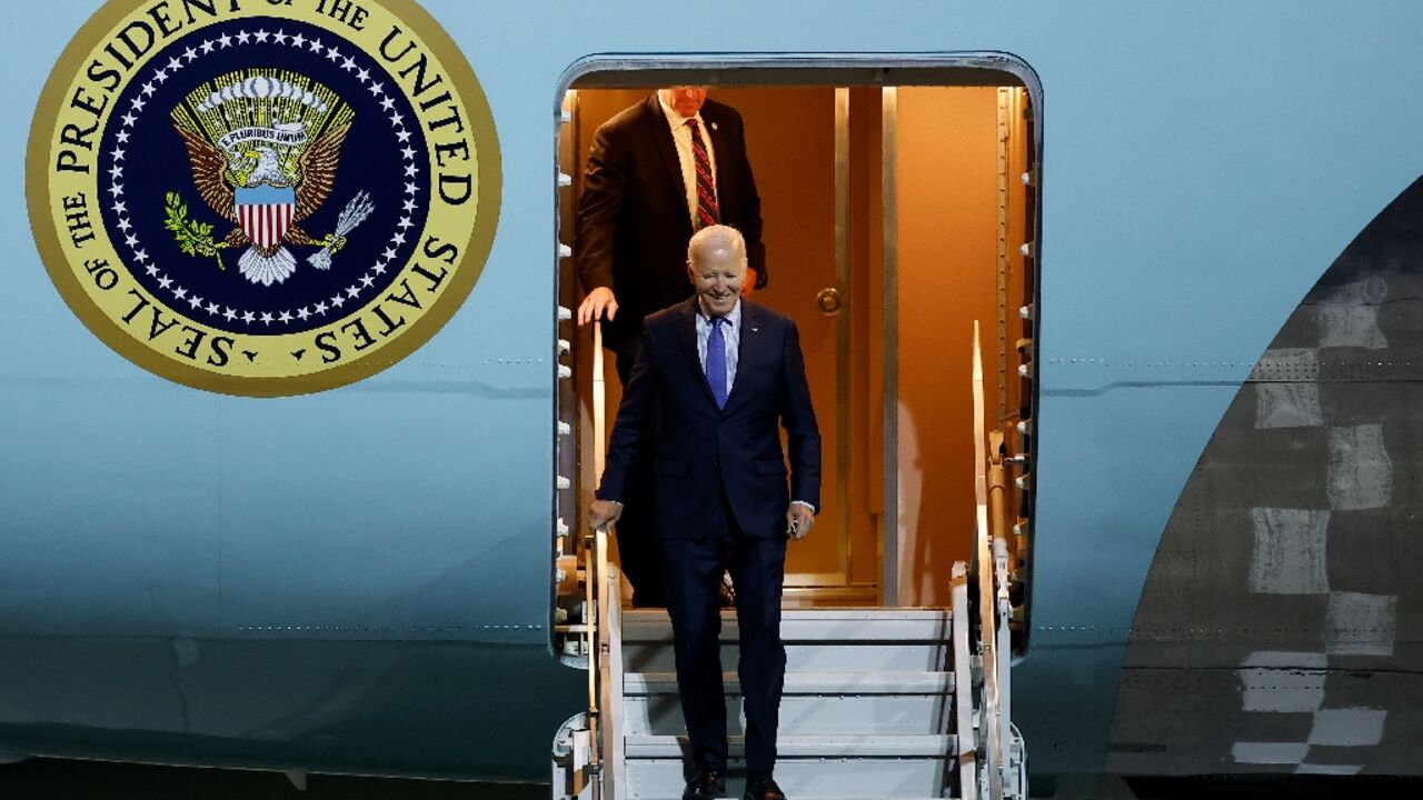 US President Joe Biden disembarks from Air Force One at Berlin-Brandenburg Airport late on October 17, 2024