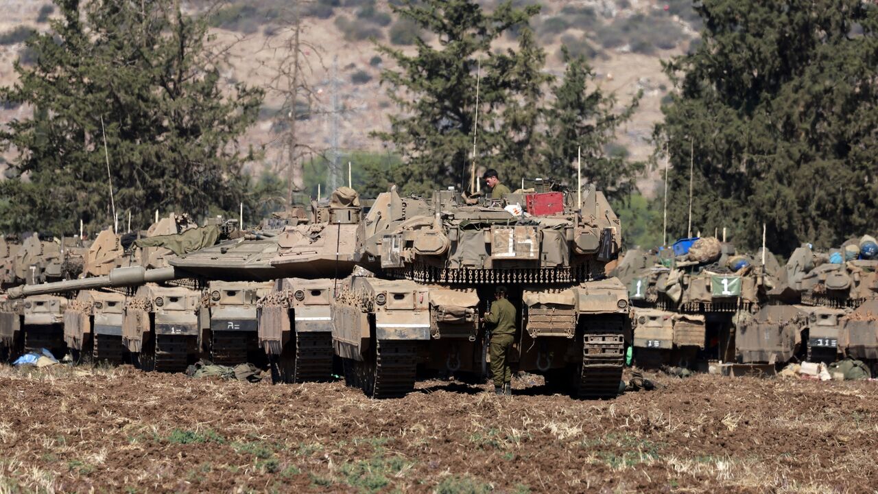 Israeli army tanks are deployed in the Upper Galilee region of northern Israel near the border with Lebanon on Sept. 29, 2024.