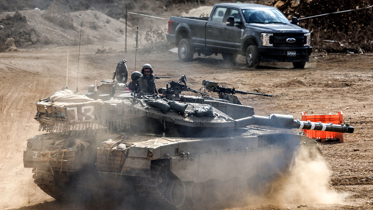 An Israeli army main battle tank moves at a position along the border with Lebanon in northern Israel on October 1, 2024. The Israeli army on October 1 said it launched a ground offensive in Lebanon and that its forces engaged in clashes, further escalating the conflict after a week of intense air strikes that killed hundreds. The UN peacekeeping mission in Lebanon said, however, the Israeli operation did not amount to a "ground incursion" and while Hezbollah denied any troops had crossed the border, an Isr