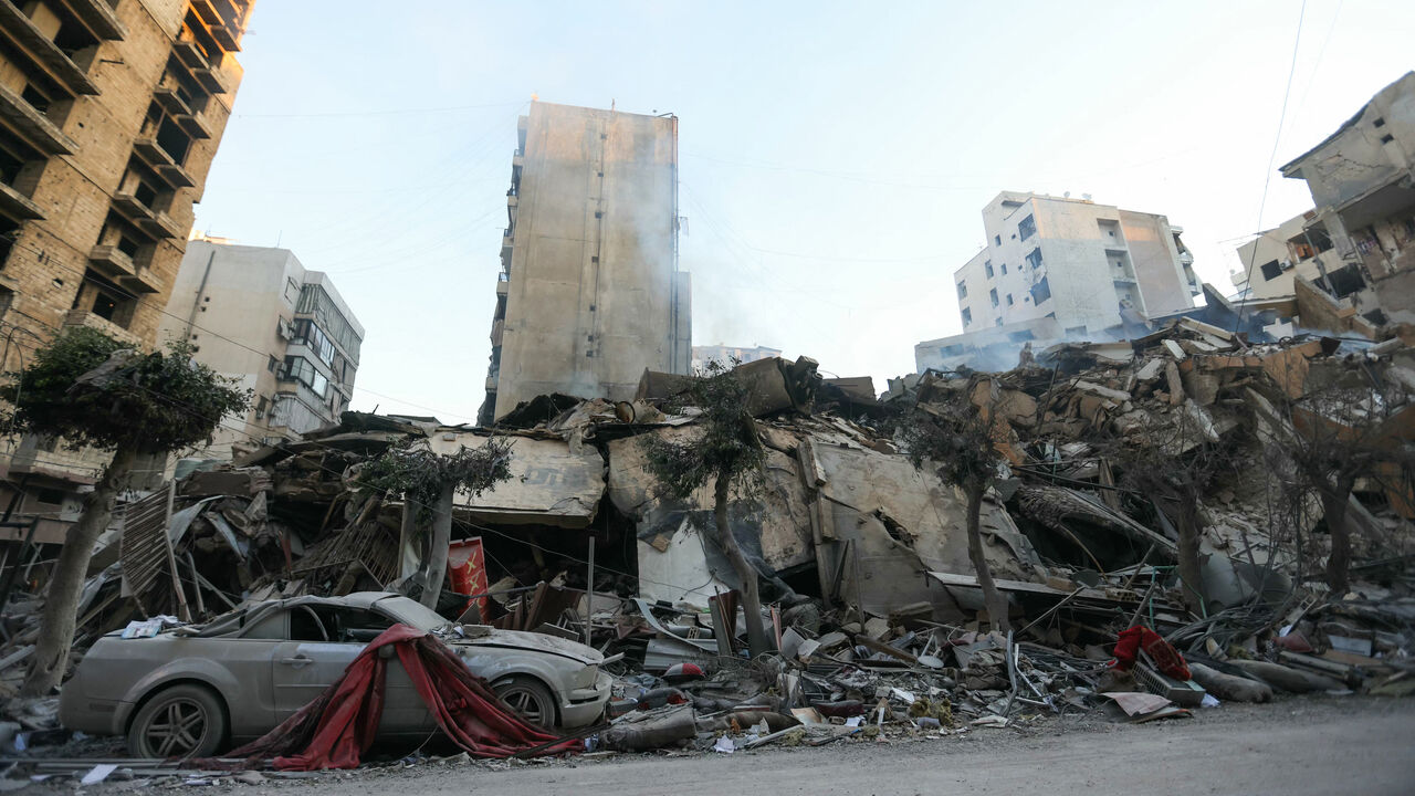 A picture shows a view of the destruction at the site of overnight Israeli airstrikes on the Mouawad neighborhood in Beirut's southern suburbs on Oct. 4, 2024. 