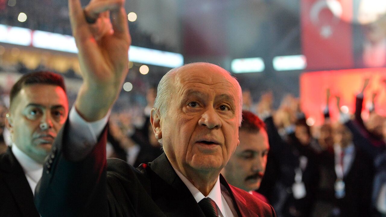 Turkey's right-wing Nationalist Movement Party leader Devlet Bahceli greets the crowd during the party's 12th Ordinary Grand Congress in Ankara, on March 18, 2018.