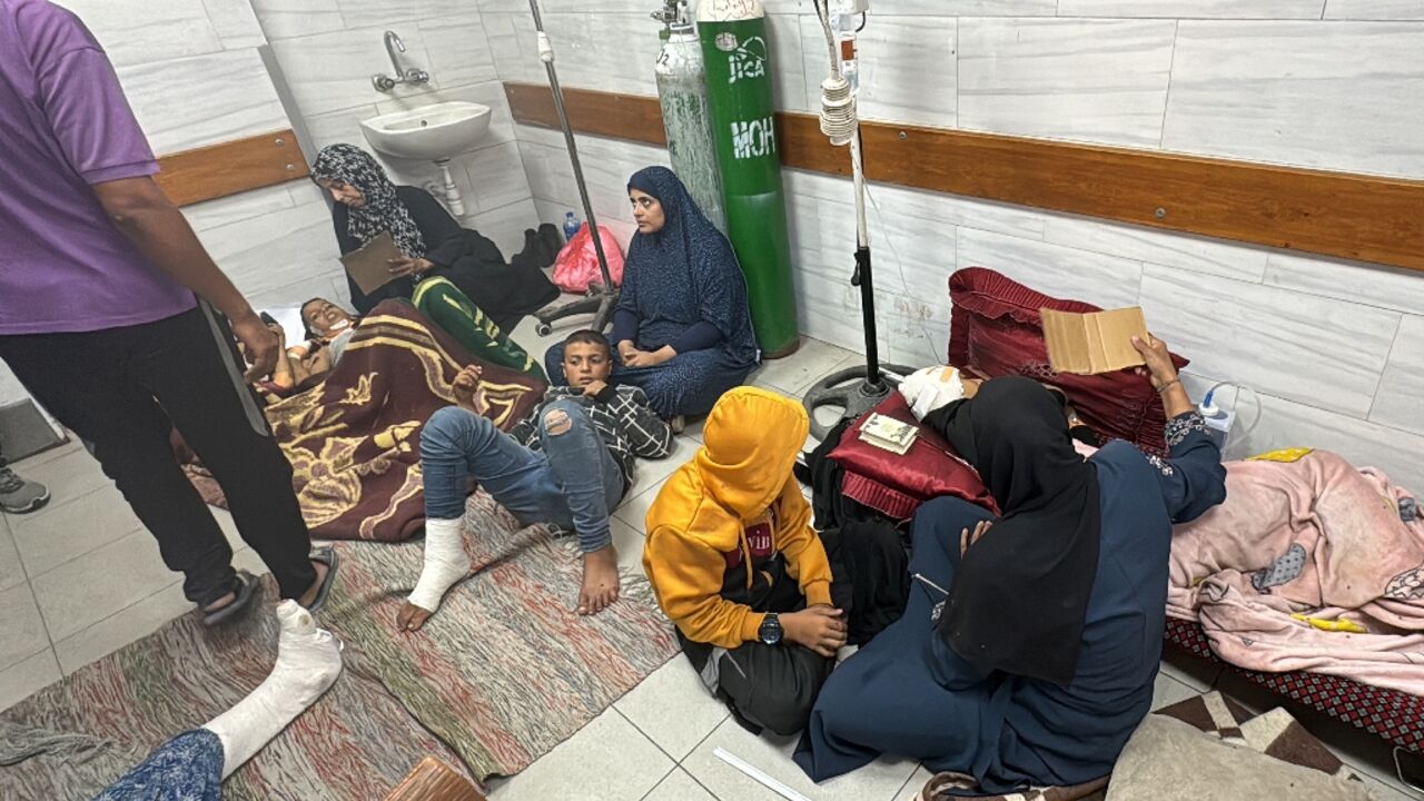 Women and children wait for medical attention at Kamal Adwan Hospital, which Gaza's health ministry was raided by Israeli forces