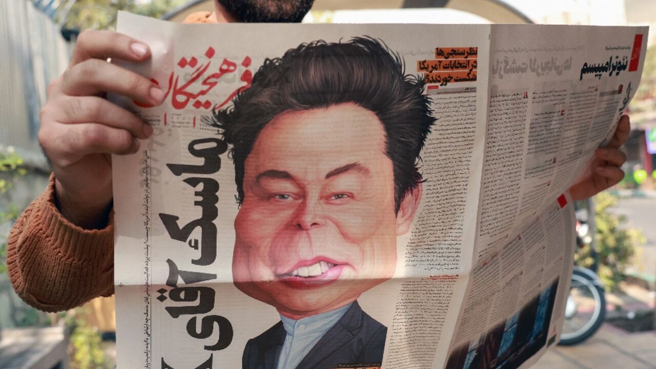 An Iranian with the daily newspaper Farhikhtegan which printed a cartoon of Elon Musk on its front page