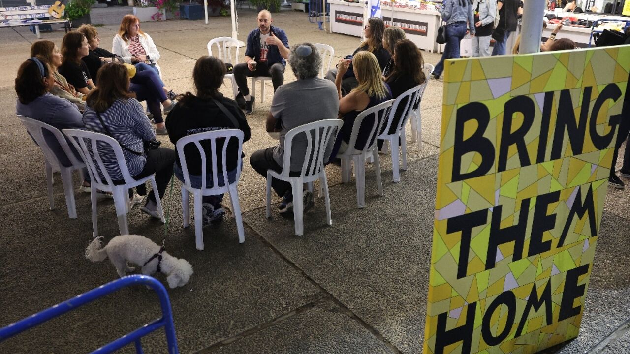 Relatives of Israeli hostages held in Gaza share their stories with with supporters at 'Hostage Square' in Tel Aviv