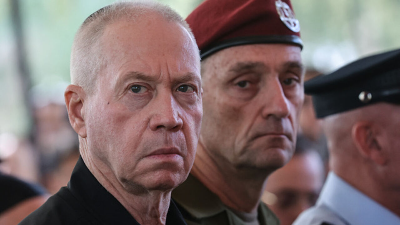 ISRAEL-PALESTINIAN-CONFLICT-ANNIVERSARY Israel's Defence Minister Yoav Gallant (L) and Chief of the General Staff Lieutenant-General Herzi Halevi, attend a ceremony marking the Hebrew calendar anniversary of the Hamas attack on October 7 last year that sparked the ongoing war in Gaza, at the Mount Herzl military cemetery in Jerusalem on October 27, 2024. (Photo by GIL COHEN-MAGEN / POOL / AFP) (Photo by GIL COHEN-MAGEN/POOL/AFP via Getty Images)