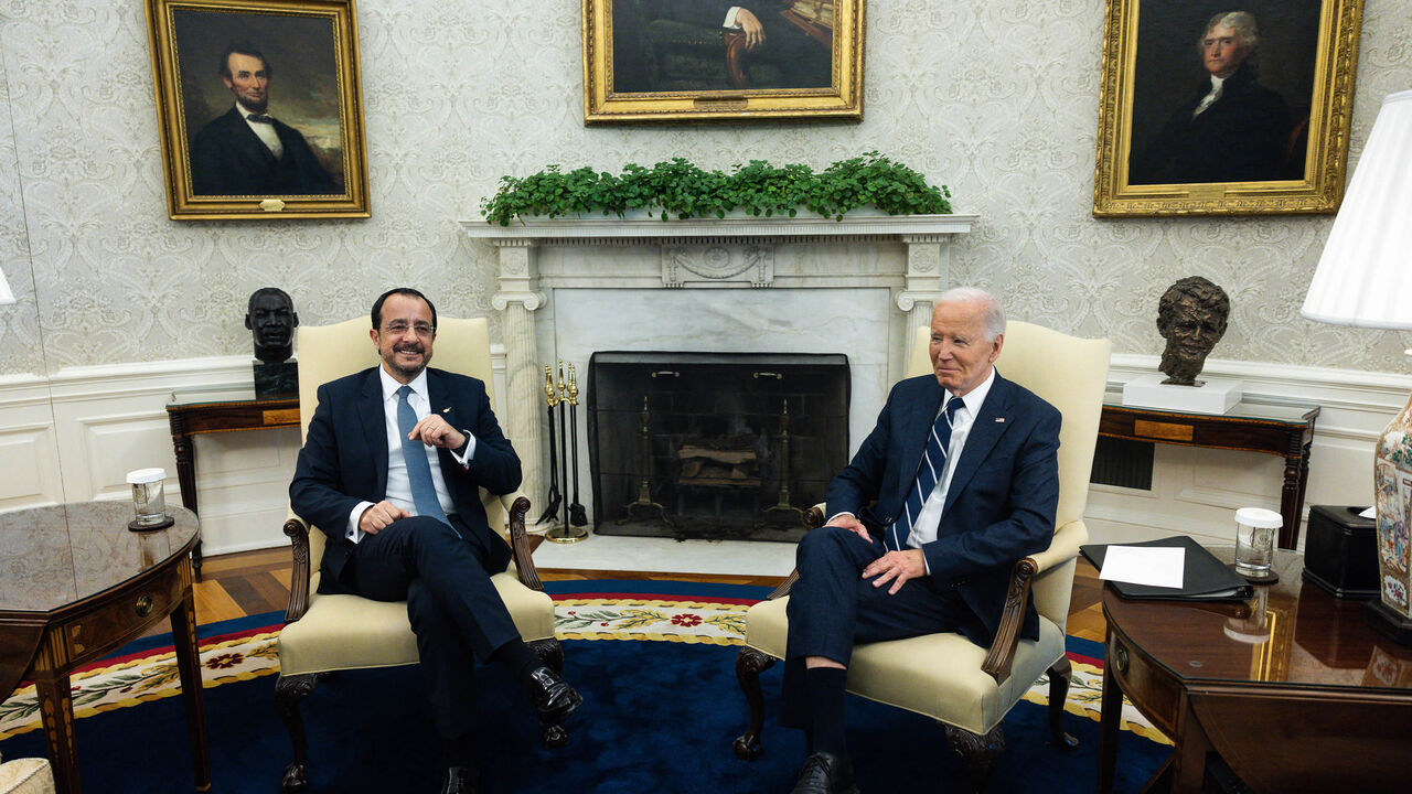 US President Joe Biden (R) holds a bilateral meeting with Cypriot President Nikos Christodoulides in the Oval Office of the White House, Washington, Oct. 30, 2024.