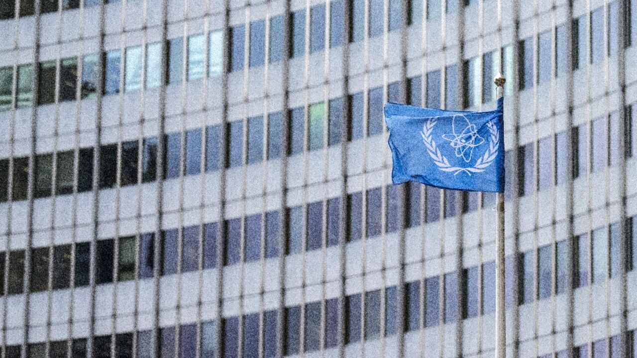 The flag of the UN's International Atomic Energy Agency (IAEA) flutters outside the agency's headquarters in Vienna on November 20, 2024, when Western countries submitted a resolution critical of Iran