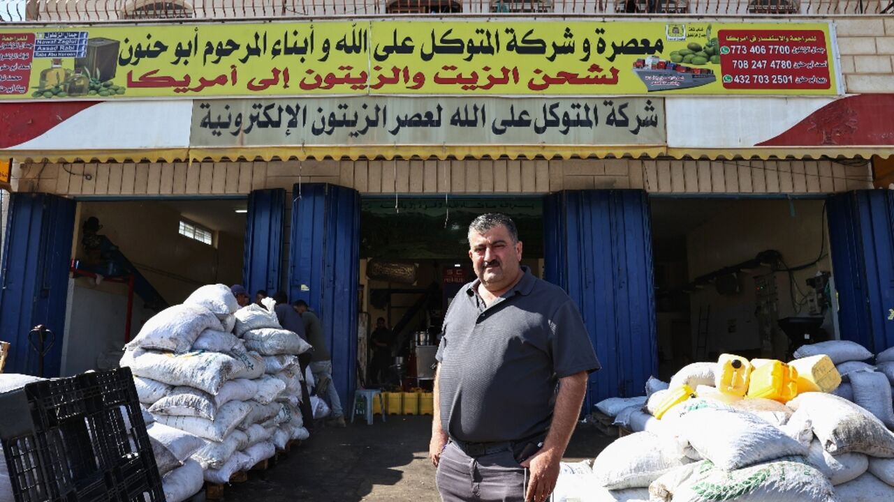 Palestinian-American entrepreneur Jamal Zaglul, in front of his olive press in Turmus Aya, in the Israeli-occupied West Bank, speaks fondly of former US president Bill Clinton