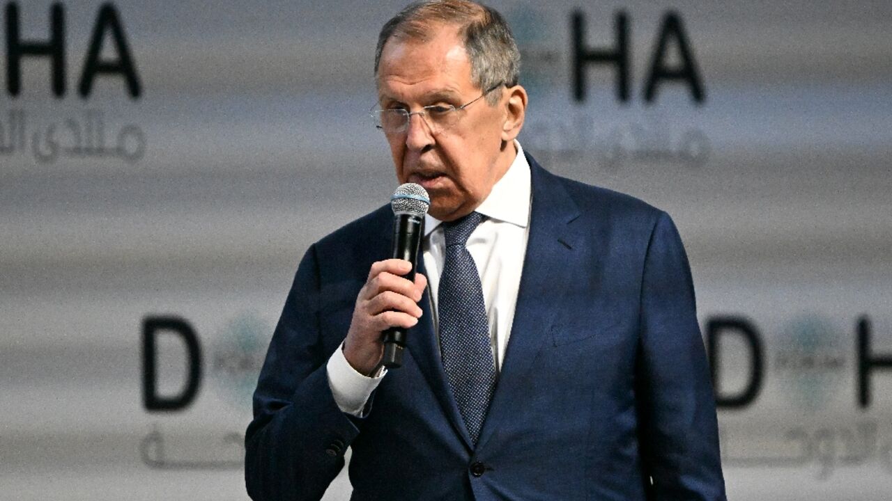 Russian Foreign Minister Sergei Lavrov addresses the Doha Forum, where he held talks on the lightning rebel advance through Syria that has left the forces of Moscow ally President Bashar al-Assad in disarray.