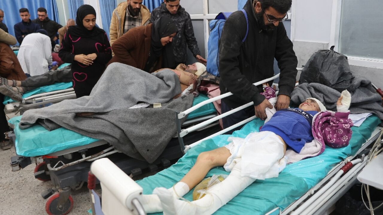 Wounded Palestinians receive medical attention at the Al-Shifa hospital in Gaza City