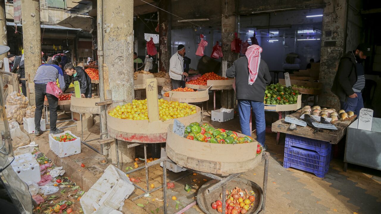 Vendors and shoppers crowd a market in Hama, Syria, as daily life continues under anti-regime armed groups, who recently took control of the city, Dec. 7, 2024.