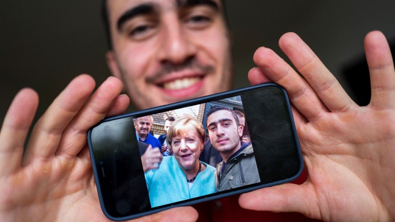 Syrian refugee Anas Modamani took a selfie with Germany's then chancellor Angela Merkel   in 2015