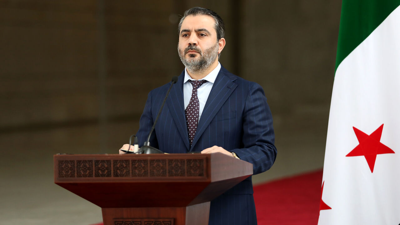 DAMASCUS, SYRIA - DECEMBER 30: Syria's newly appointed Foreign Minister Asaad Hassan al-Shibani during a press conference after a meeting between the Syrian leadership and a Ukrainian delegation to help strengthen ties between the two countries on December 30, 2024 in Damascus, Syria. Syria is transitioning after the fall of the Baath regime and the Assad family's rule, with a temporary administration now in place in Damascus and Aleppo. (Photo by Ali Haj Suleiman/Getty Images)