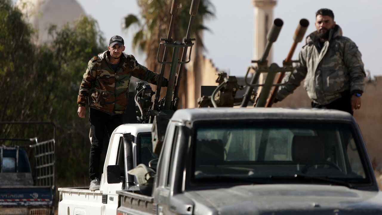 Forces loyal to the new Syrian government gather in the town of Busra in Syria's southern Daraa province, on Jan. 5, 2025. 