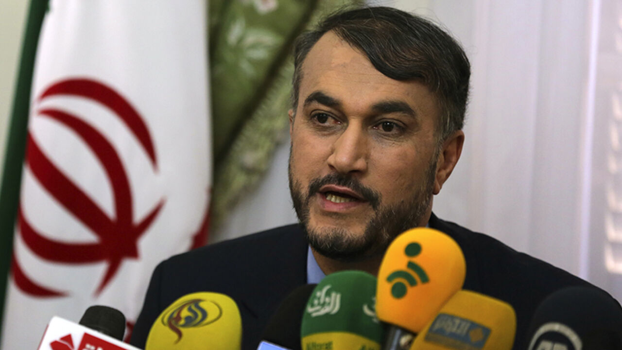 Hossein Amir-Abdollahian, Iran's envoy to the Organisation of Islamic Cooperation (OIC), speaks during a news conference about the new political relations between Iran and Egypt after the newly elected Egyptian President Abdel Fattah al-Sissi was sworn in, at the Iranian embassy in Cairo June 9, 2014. REUTERS/Mohamed Abd El Ghany (EGYPT - Tags: POLITICS) - RTR3SWSY