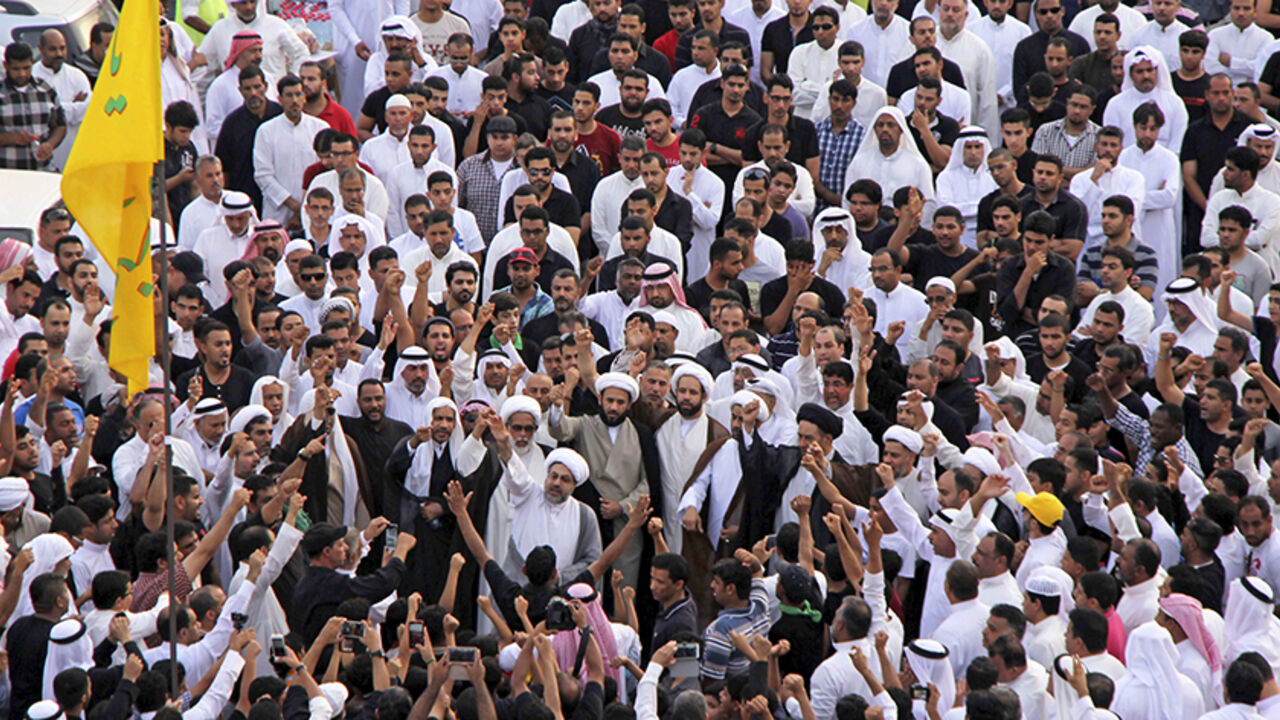 Shi'ites chant slogans during a rally following Friday's suicide attack at a Shi'ite mosque, at Qatif, in east Saudi Arabia May 23, 2015. A suicide bomber killed 21 worshippers on Friday in the packed Shi'ite mosque in eastern Saudi Arabia, residents and the health minister said, the first attack in the kingdom to be claimed by Islamic State militants. More than 150 people were praying when the huge explosion ripped through the Imam Ali mosque in the village of al-Qadeeh, witnesses said. Picture taken May 2