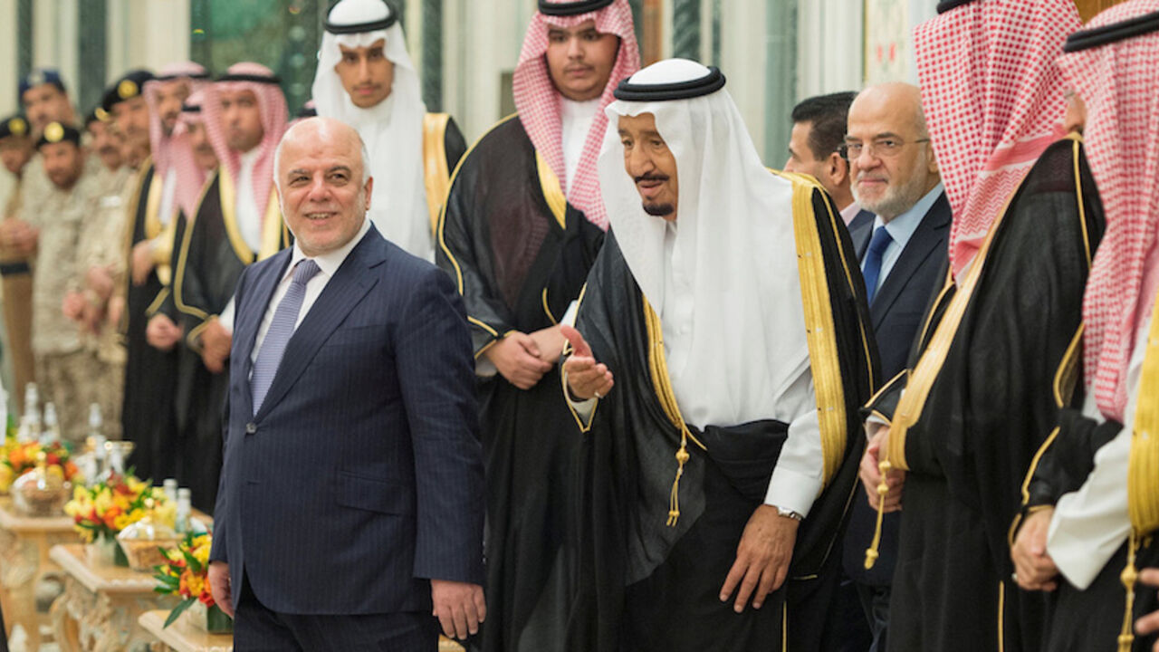 Saudi Arabia's King Salman bin Abdulaziz Al Saud (R) receives Iraqi Prime Minister Haider al-Abadi in Jeddah, Saudi Arabia, June 19, 2017. Bandar Algaloud/Courtesy of Saudi Royal Court/Handout via REUTERS ATTENTION EDITORS - THIS PICTURE WAS PROVIDED BY A THIRD PARTY. - RTS17RRQ