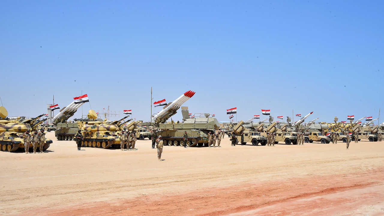 Military students stand at attention to mark the opening of the Mohamed Najib military base, the graduation of new graduates from military colleges, and the celebration of the 65th anniversary of the July 23 revolution at El Hammam City in the North Coast, in Marsa Matrouh, Egypt, July 22, 2017 in this handout picture courtesy of the Egyptian Presidency. The Egyptian Presidency/Handout via REUTERS ATTENTION EDITORS - THIS IMAGE WAS PROVIDED BY A THIRD PARTY. - RC1831D7DF40