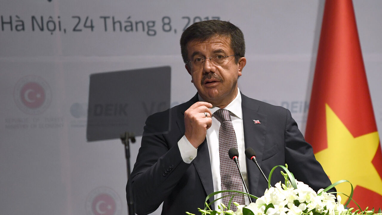 Turkey's Minister of Economy Nihat Zeybekci speaks at the Vietnam-Turkey Business Forum in Hanoi on August 24, 2017. 
Turkey's Prime Minister Binali Yildirim and Zeybekci are on a three-day official visit to Vietnam focused on fostering closer bilateral ties. / AFP PHOTO / HOANG DINH Nam        (Photo credit should read HOANG DINH NAM/AFP/Getty Images)