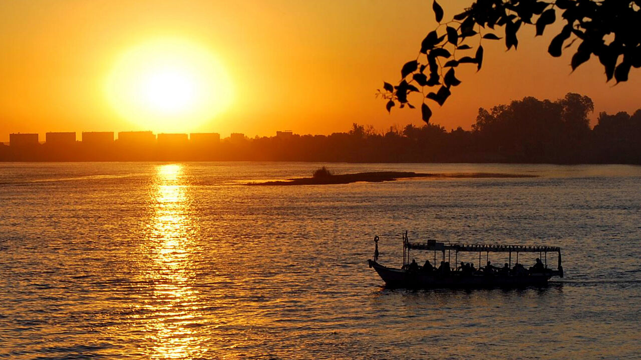 The sun sets over the Nile River in Aswan 1,000 kms south of Cairo on May 13, 2010.  Four African countries signed on May 14, 2010 a new treaty on the equitable sharing of the Nile waters despite strong opposition from Egypt and Sudan who have the lion's share of the river waters. AFP PHOTO/AMGAD FOUAD (Photo credit should read AMGAD FUAD/AFP/Getty Images)