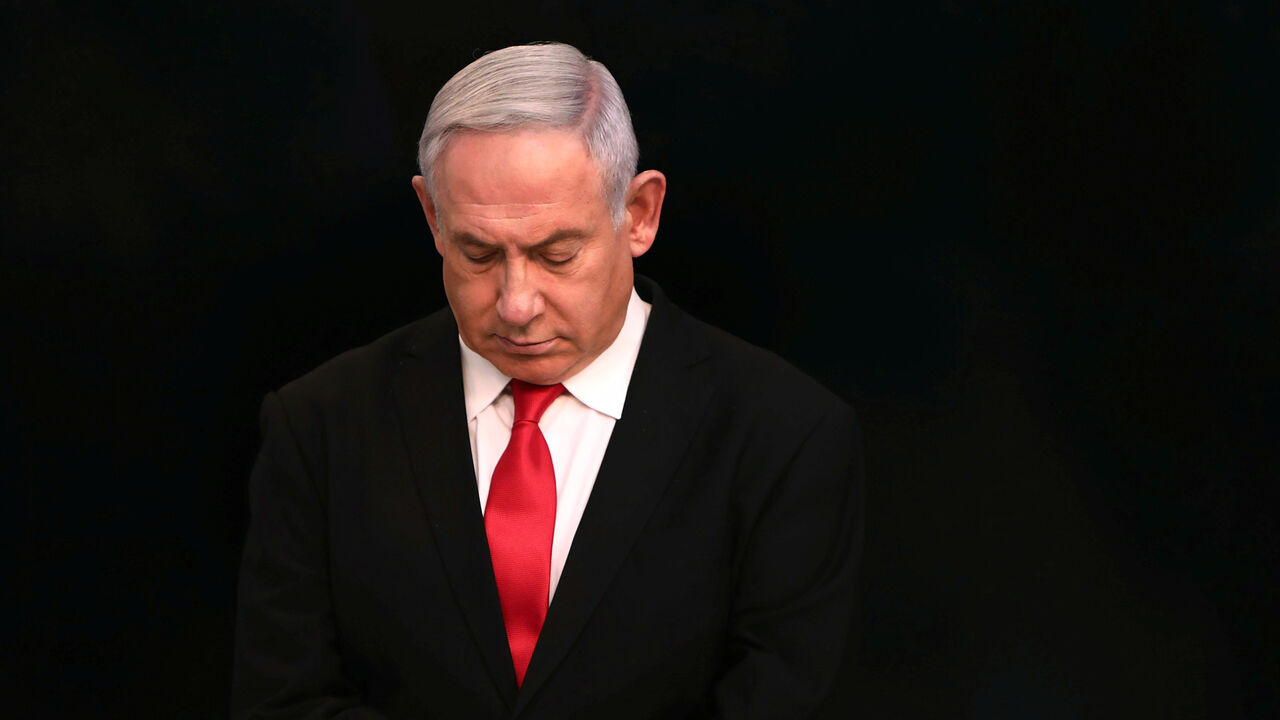 Israeli Prime Minister Benjamin Netanyahu arrives for a speech at his Jerusalem office, regarding the new measures that will be taken to fight the coronavirus, March 14, 2020. Gali Tibbon/Pool via REUTERS - RC2WJF9D9S2R