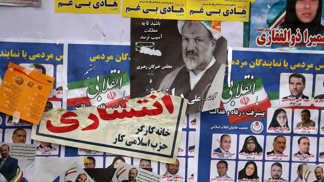 TOPSHOT - Iranian electoral posters and fliers are pictured on the last day of election campaign in Tehran on February 19, 2020. - Iran's electoral watchdog today defended its decision to disqualify thousands of candidates for a crucial parliamentary election in two days, as a lacklustre campaign neared its end. Conservatives are expected to make an overwhelming resurgence in Friday's election, which comes after months of steeply escalating tensions between Iran and its decades-old arch foe the United State