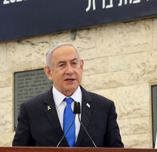 Israeli Prime Minister Benjamin Netanyahu speaks during a memorial ceremony for Israelis killed on the Hebrew calendar anniversary of the Hamas attack on October 7 last year that sparked the ongoing war in Gaza, at the Mount Herzl military cemetery in Jerusalem on Oct. 27, 2024. 